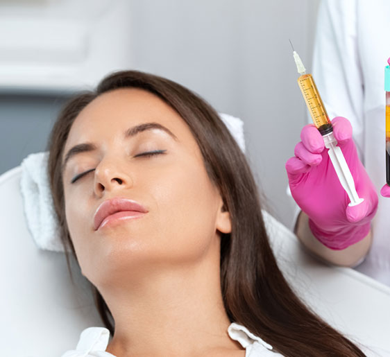Biotech-SUmmary-562x515 woman with syringe
